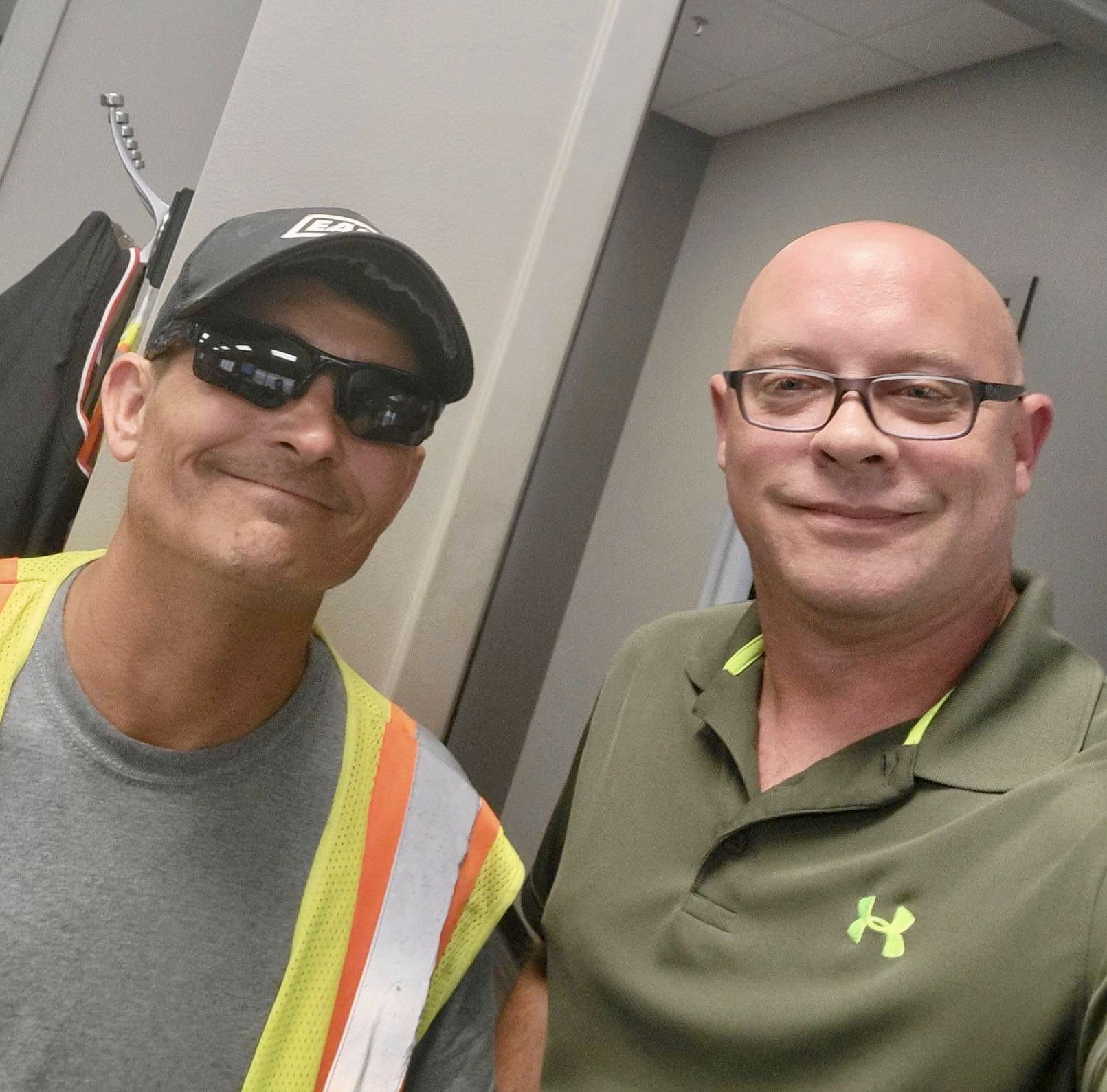 a Chief Carriers driver and safety manager Brett Kleier pose for a selfie