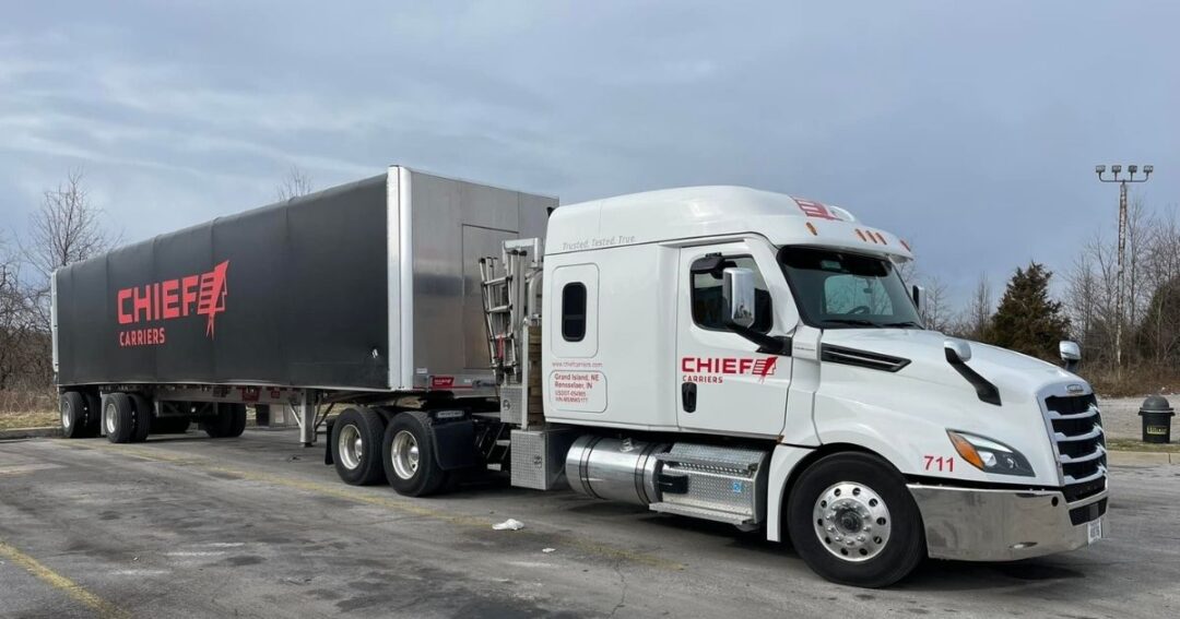 A white Chief Carriers truck