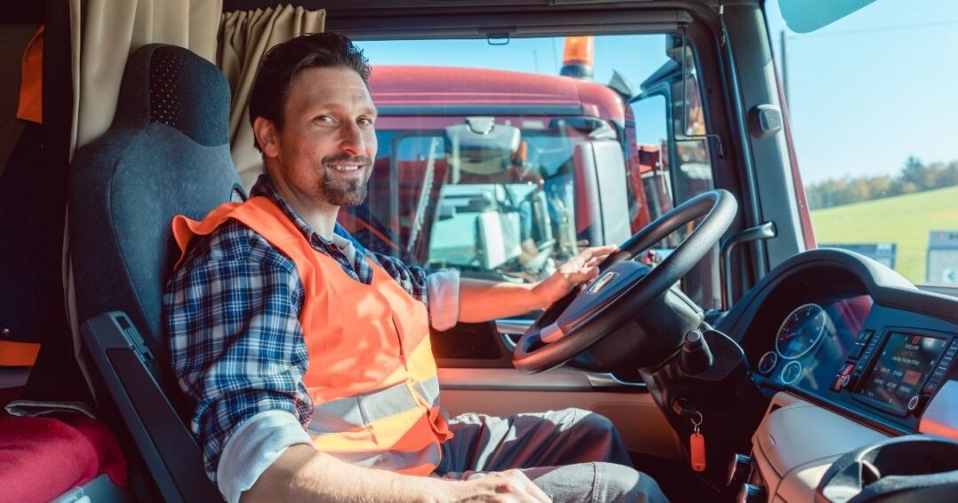 Driver behind the wheel of a semi-truck