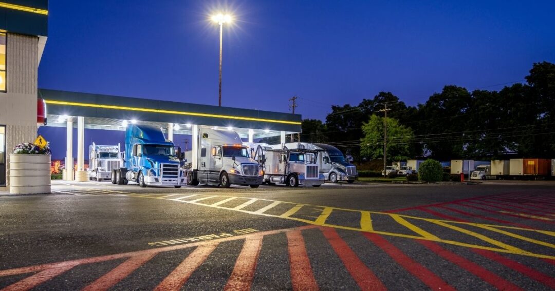 A truck stop at night. Trucking etiquette