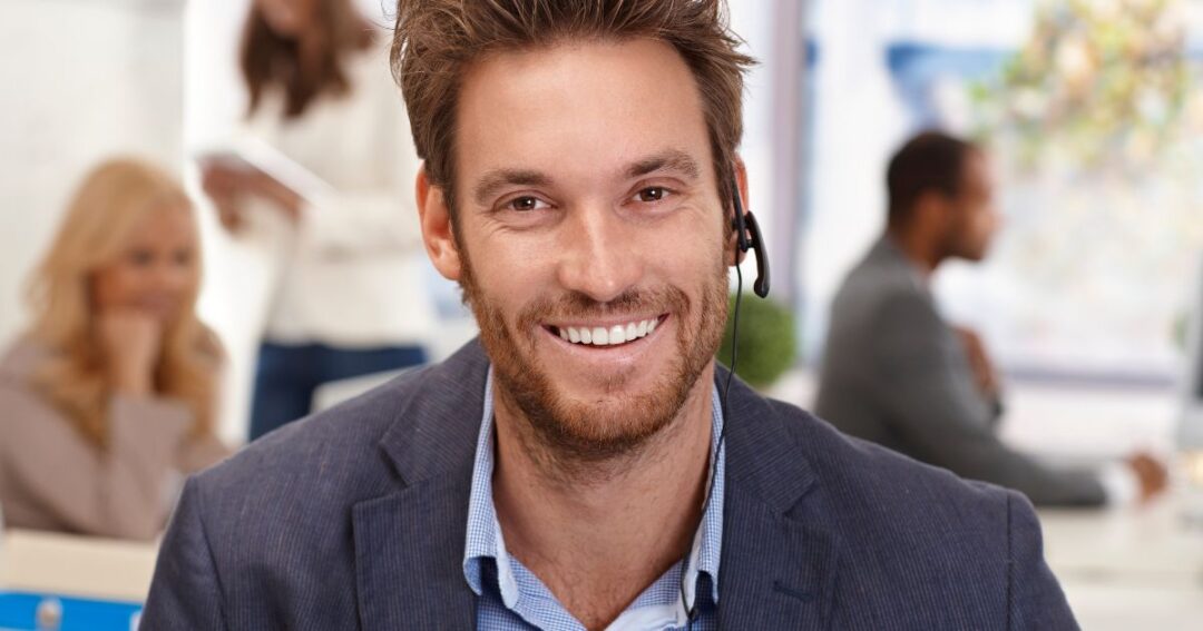 A smiling male dispatcher.