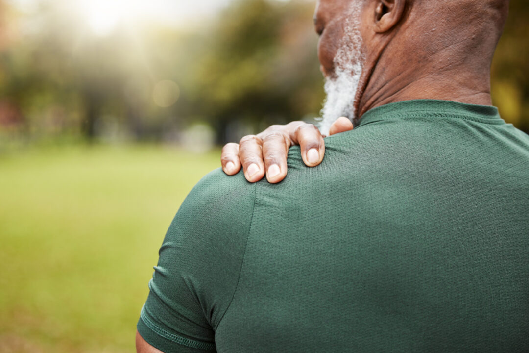 Unidentified man who appears to have pain in his left shoulder.