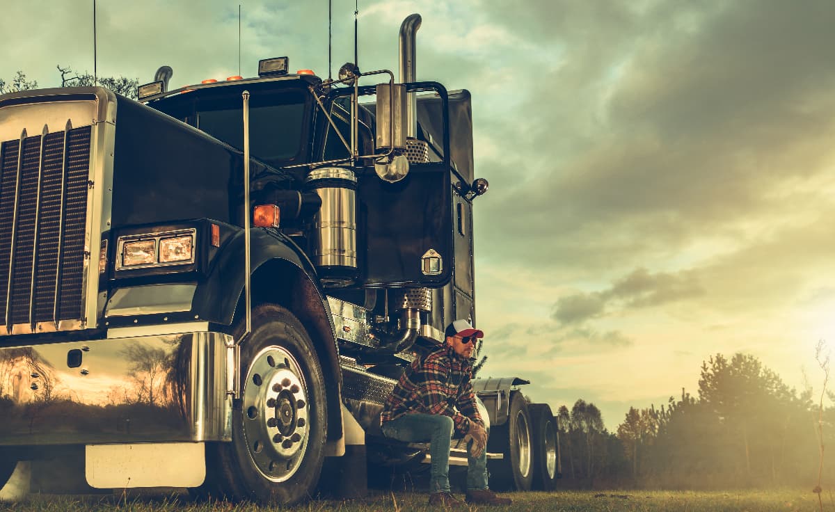 A truck driver taking a break.