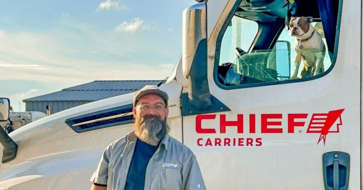 A Chief Carriers driver and his dog.